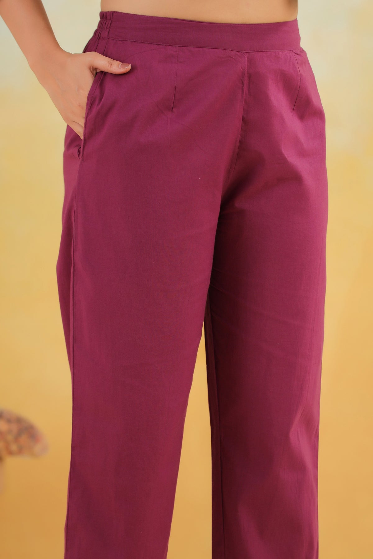 Purple cotton palazzo pants with side pockets, ideal for women's daily wear or office outfits.