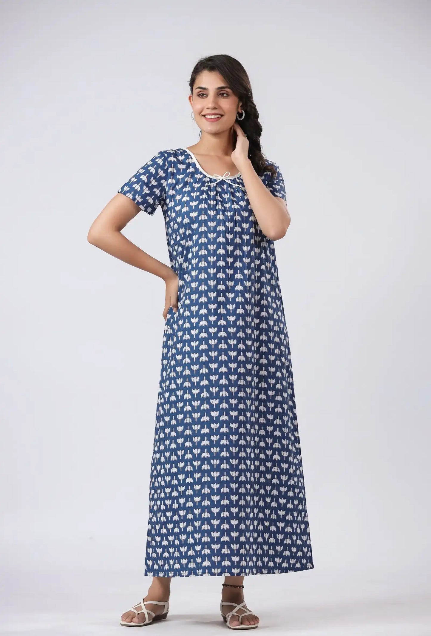 Blue floral print cotton kurta dress for women, elegant daily wear with white trim and short sleeves