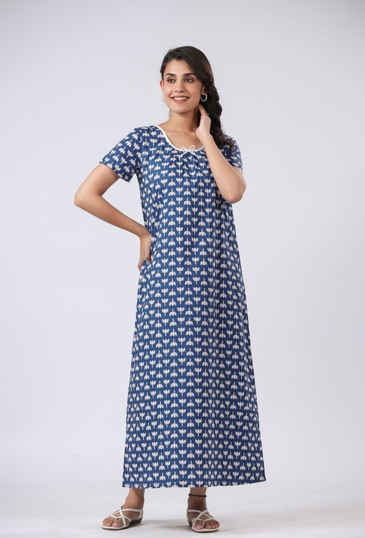 Blue floral print cotton kurta dress for women, elegant daily wear with white trim and short sleeves