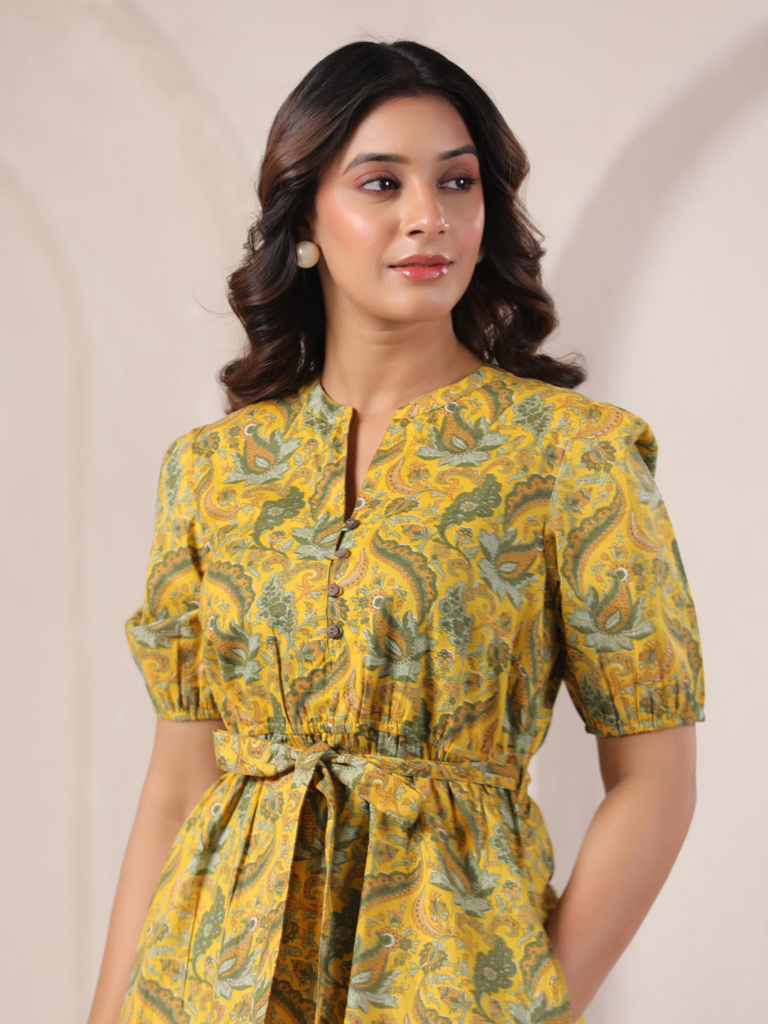 Yellow paisley print cotton kurta with puff sleeves and tie waist for women