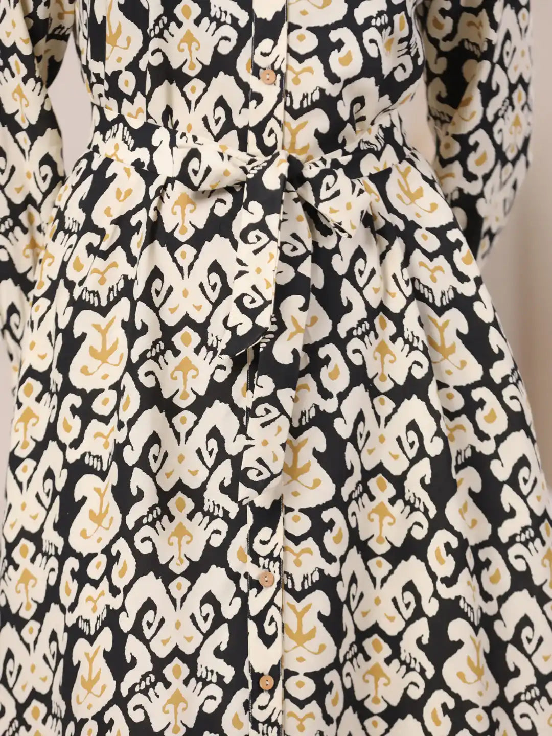 Black and white ikat print cotton kurta with gold accents and button detailing