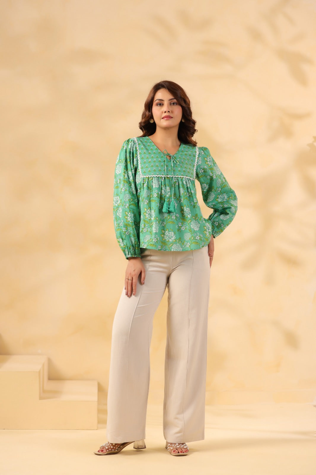 Green floral print cotton kurta with puff sleeves and cream palazzo pants for women