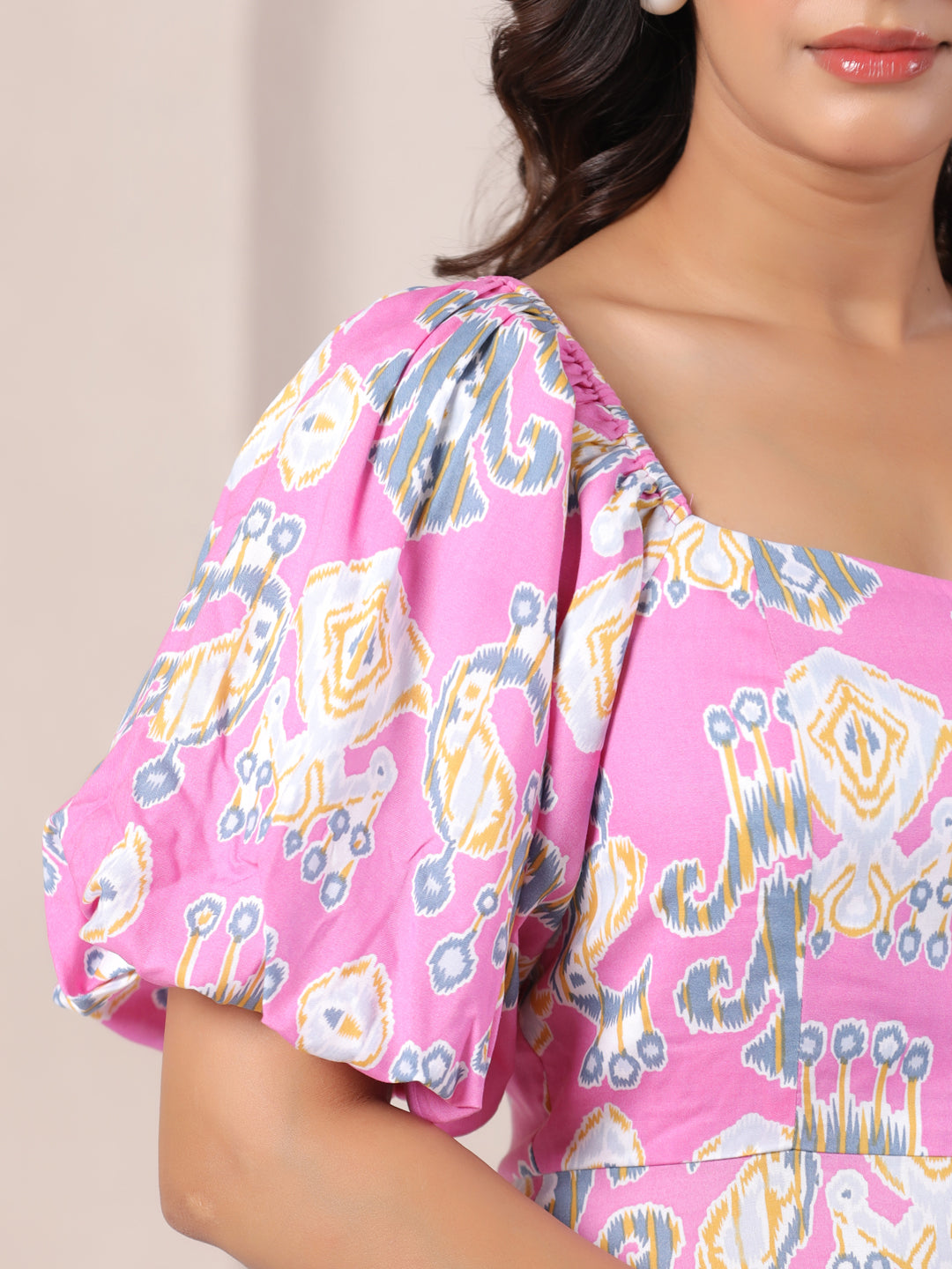 Pink ikat print kurta with puff sleeves, elegant cotton top for women