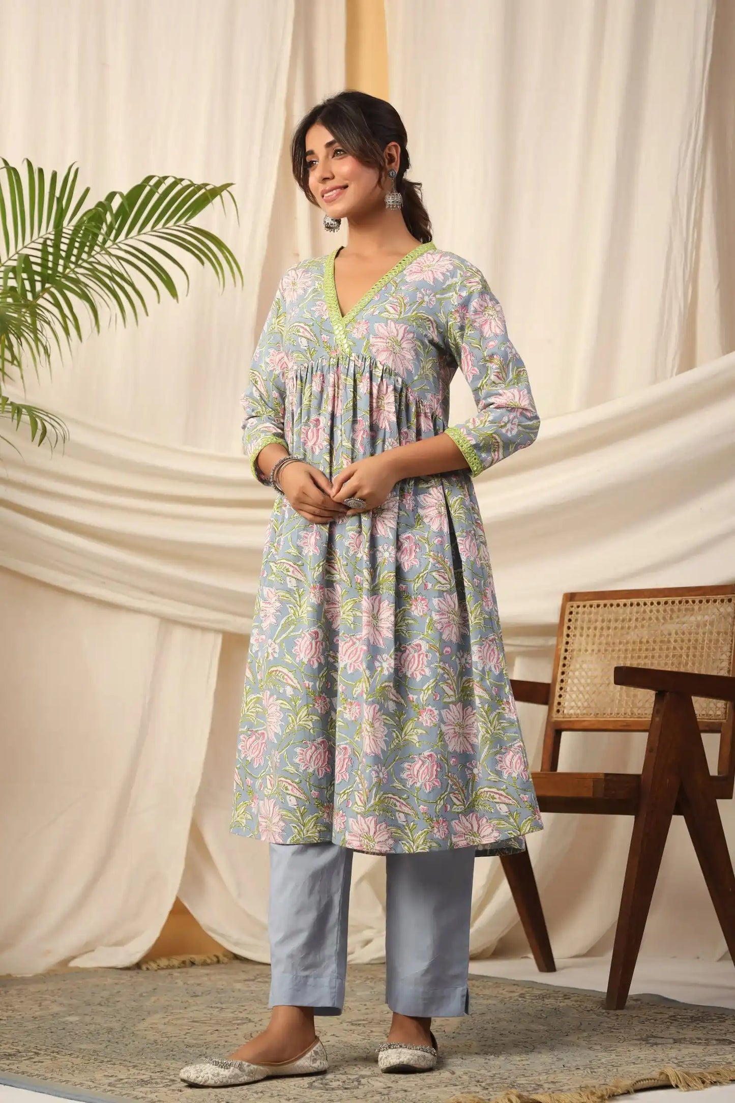 Floral print cotton kurta set with V-neck and matching pants, ideal for daily wear or office