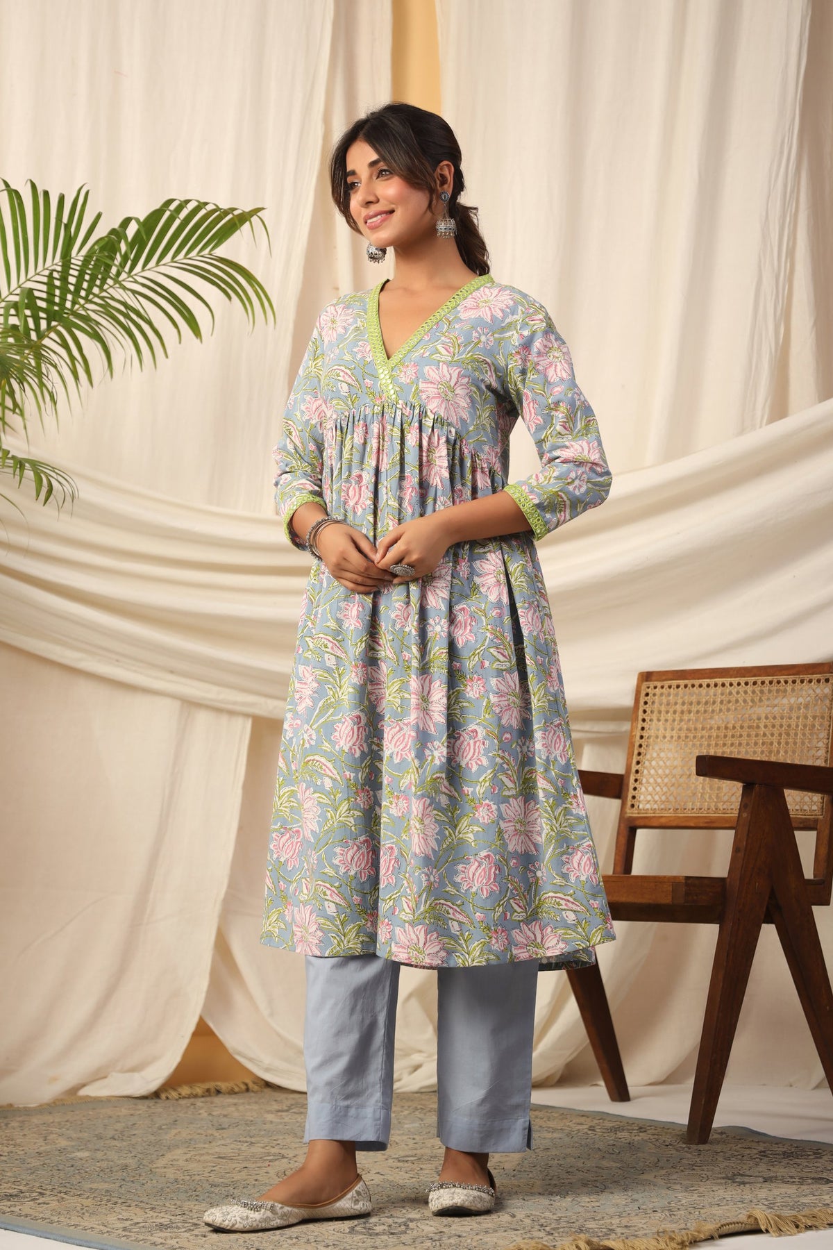 Floral print cotton kurta set with V-neck and matching pants, ideal for daily wear or office
