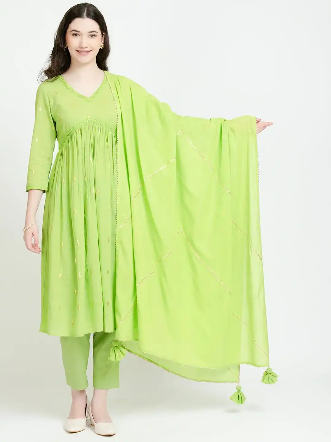 Lime green cotton kurta set with embroidered dupatta and tassels, perfect for daily wear or celebrations