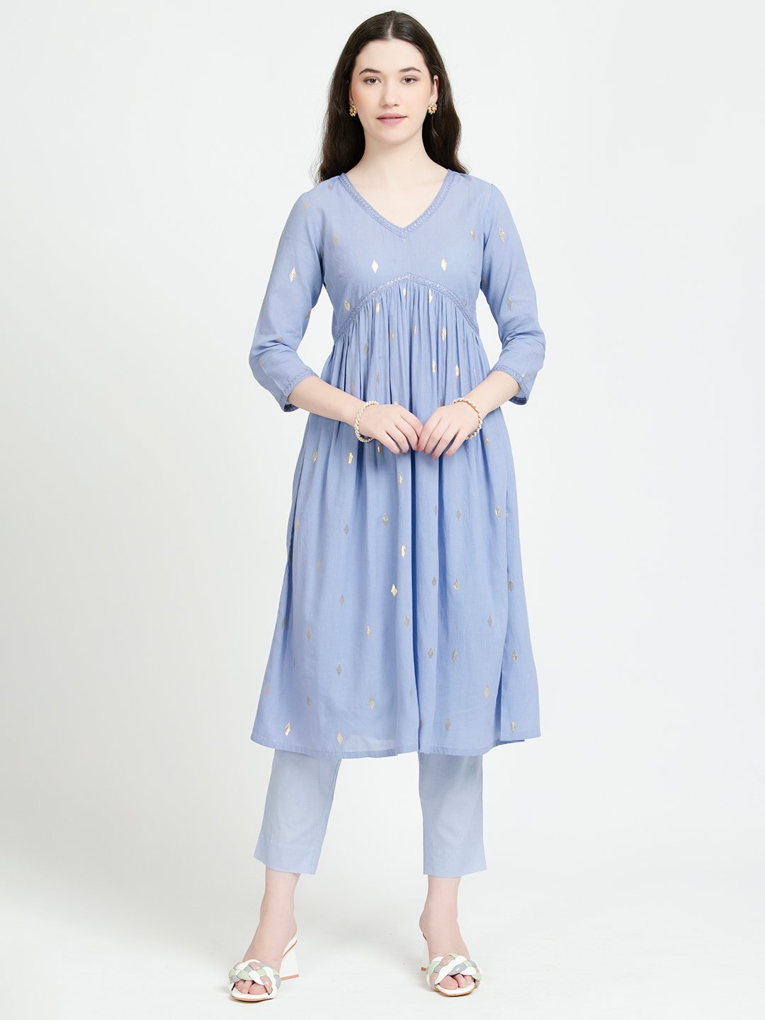 Light blue cotton kurta set with gold embroidery, perfect for daily wear or office