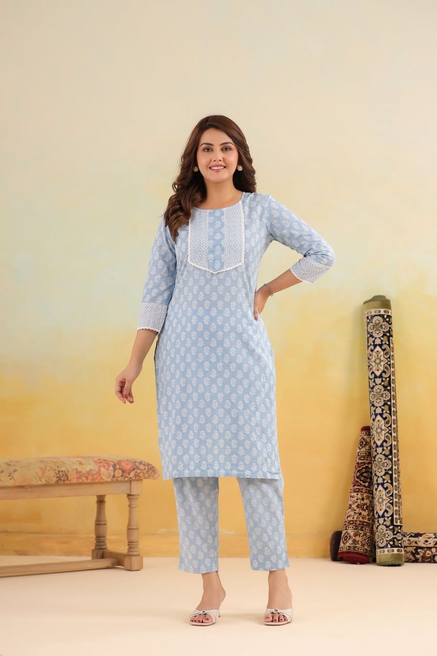 Light blue cotton kurta set with white floral print and lace detailing for women