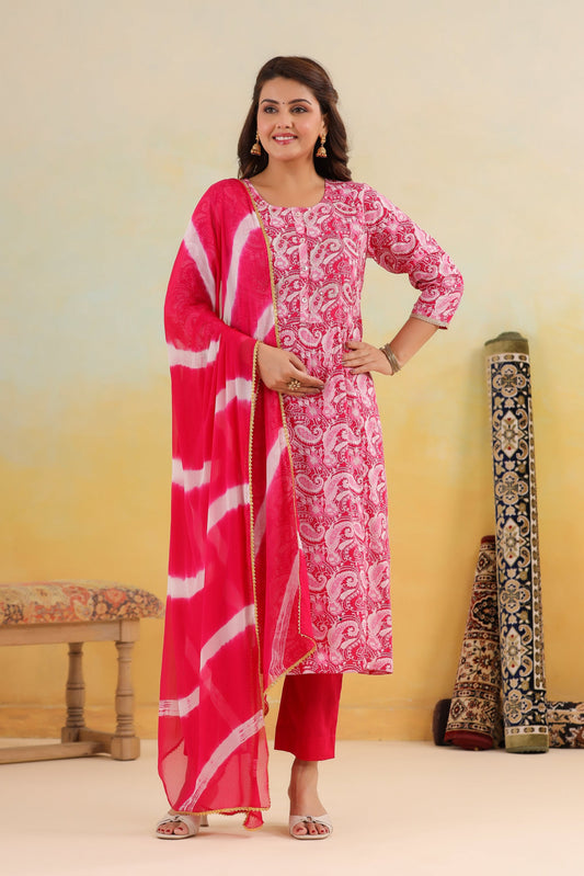 Woman wearing a pink and white traditional outfit with a yellow background