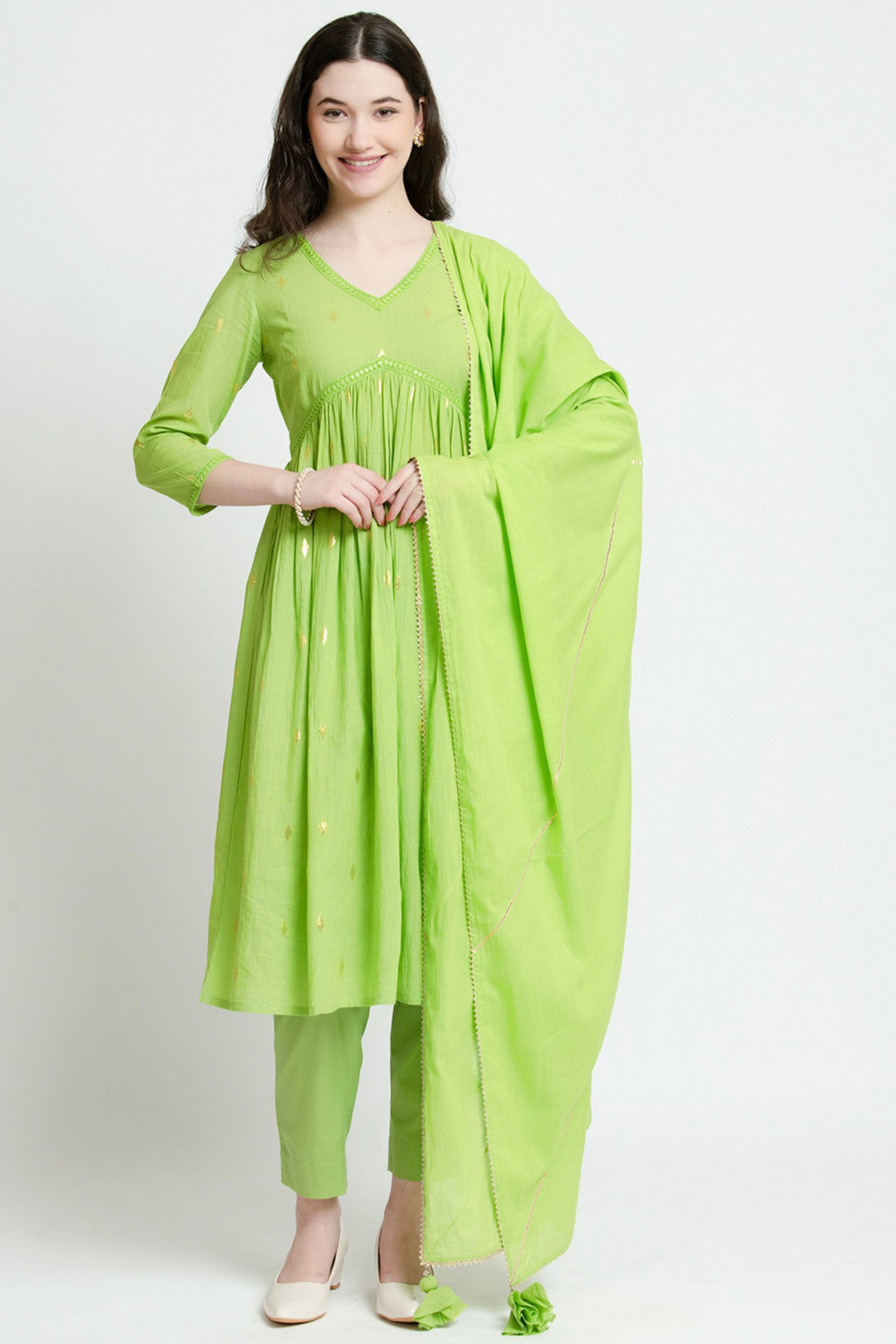 Lime green cotton kurta set with gold embroidery, palazzo pants, and matching dupatta for women