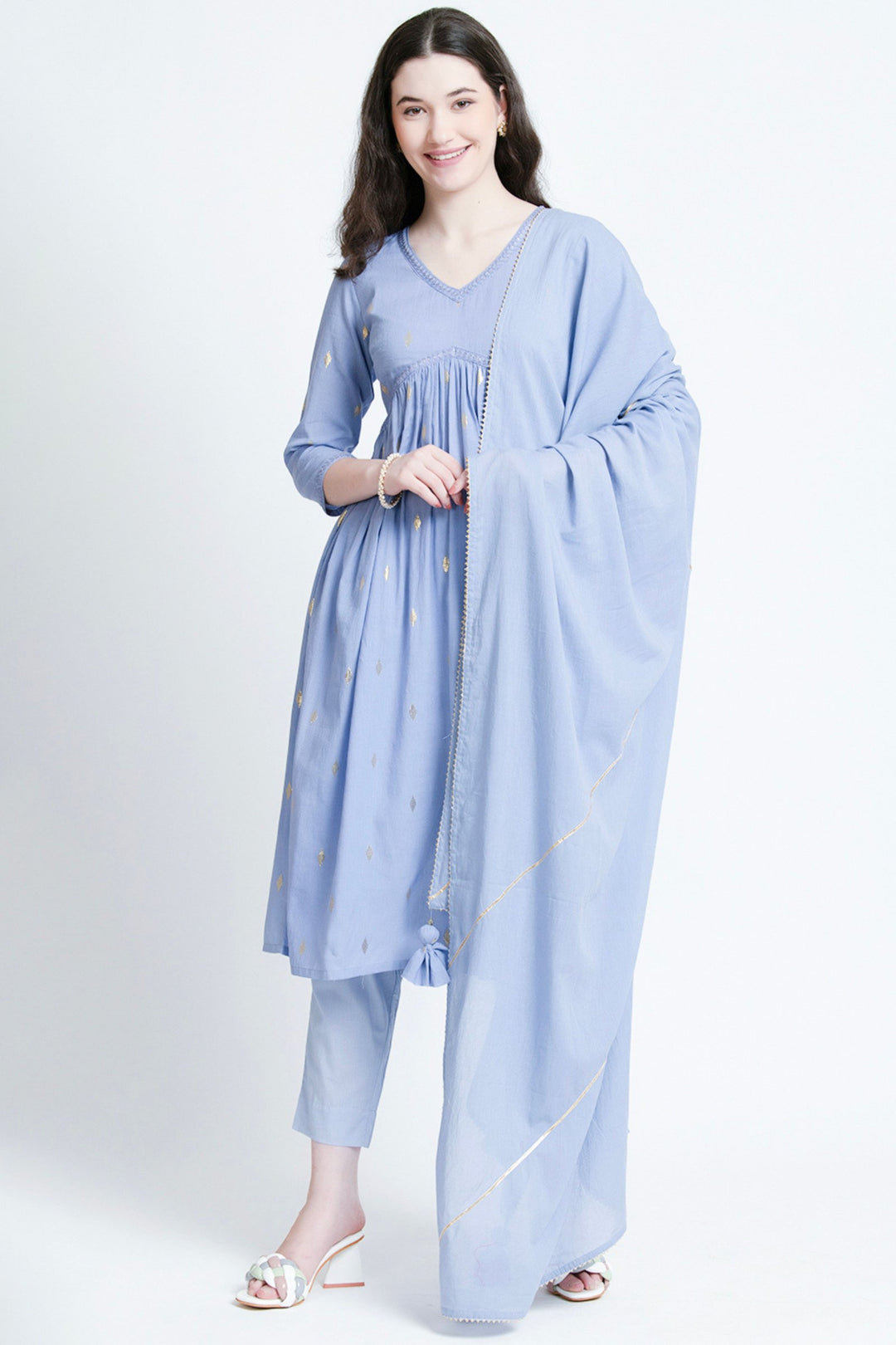 Light blue cotton kurta set with gold embroidery, palazzo pants, and matching dupatta for women