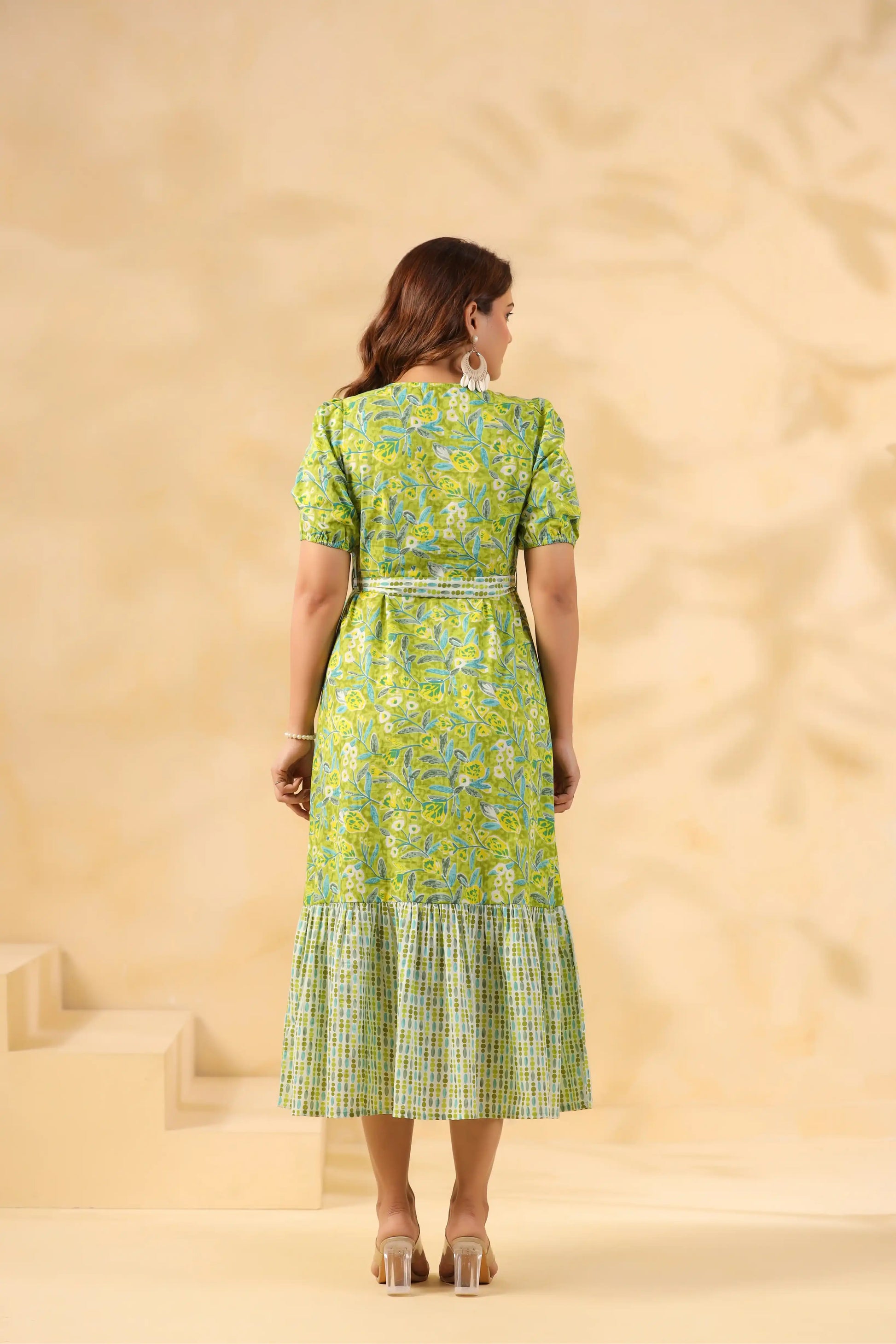 Green floral print cotton kurta with tiered hem, perfect for daily wear or celebrations