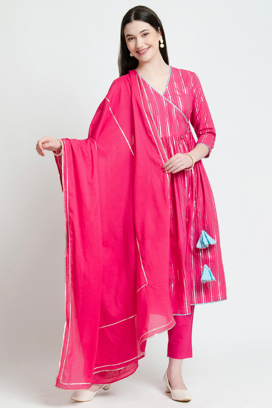 Pink cotton kurta set with silver stripes and blue tassels, paired with matching pants and dupatta for women