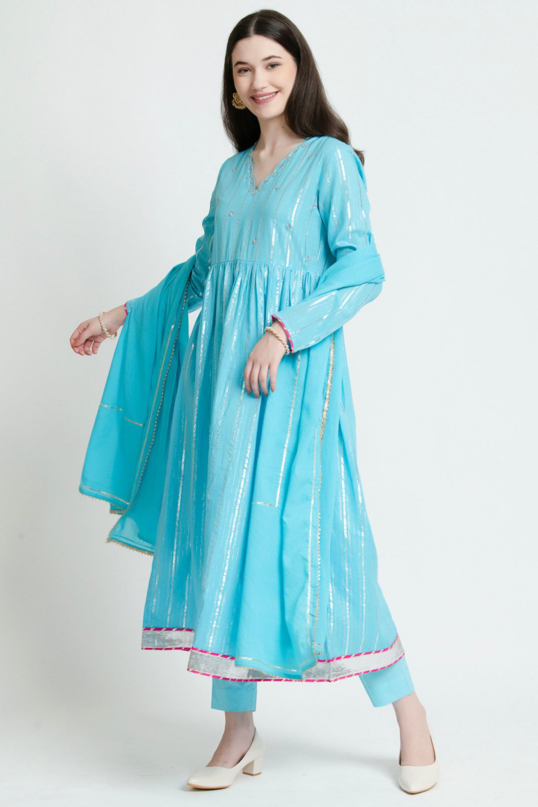 Turquoise cotton kurta set with silver stripes and pink trim, elegant for daily wear or celebrations