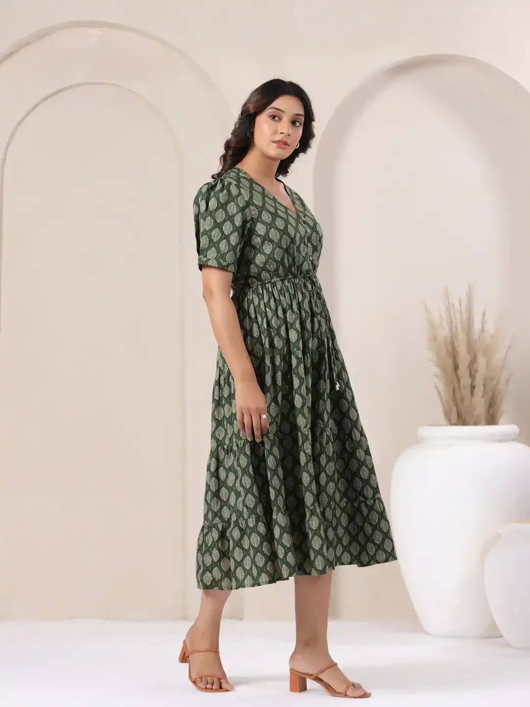 Green leaf-print cotton midi dress with puff sleeves, ideal for daily wear or office