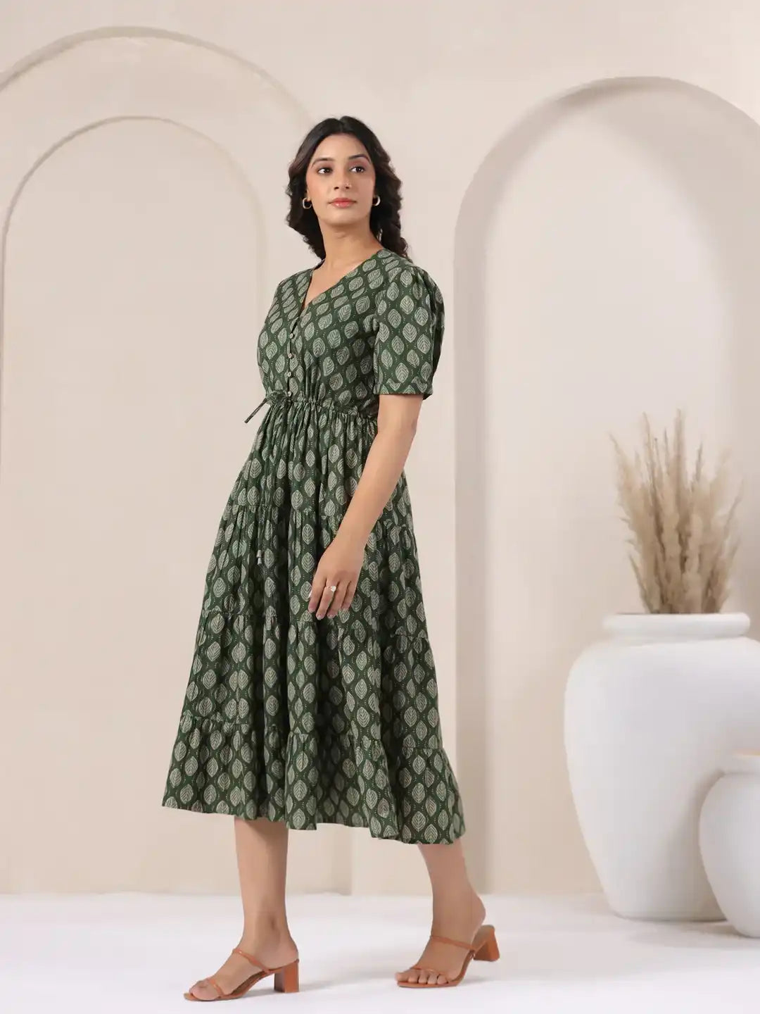 Green leaf-print cotton midi dress with puff sleeves, ideal for daily wear or office