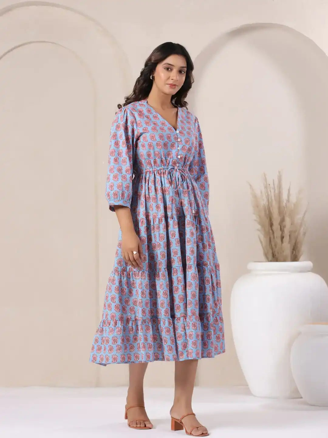 Blue cotton kurta dress with pink floral print, tiered skirt, and V-neck for women's daily wear