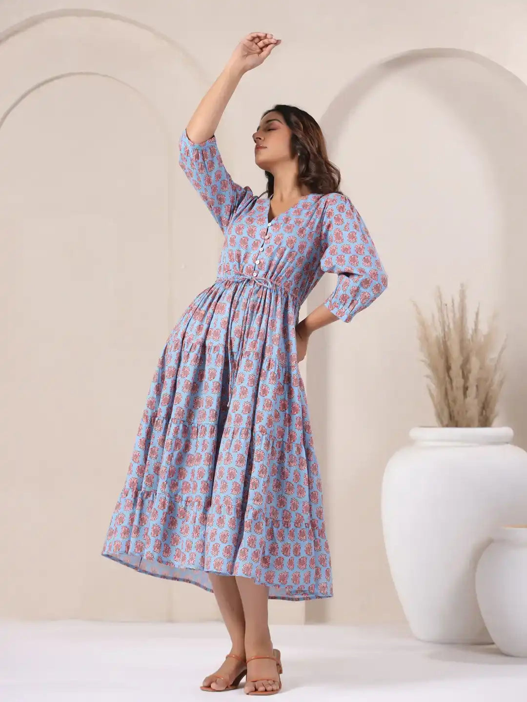Blue cotton kurta dress with red floral print, tiered skirt, and puff sleeves for women