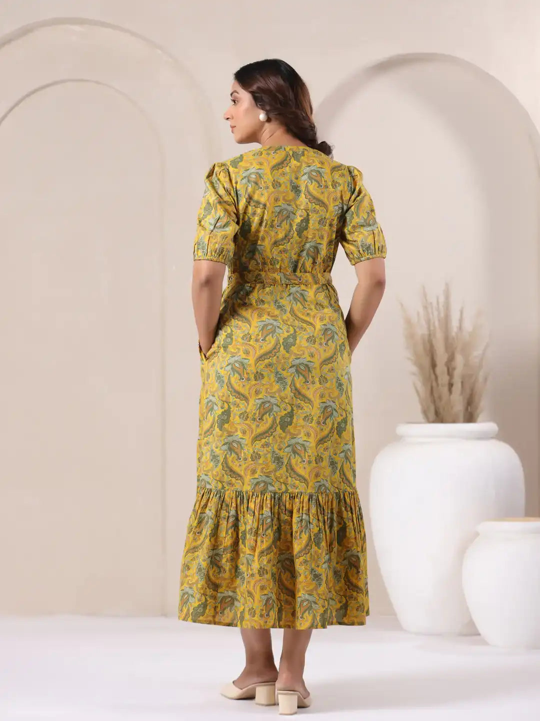 Yellow paisley print cotton kurta dress with ruffled hem, perfect for daily wear or celebrations