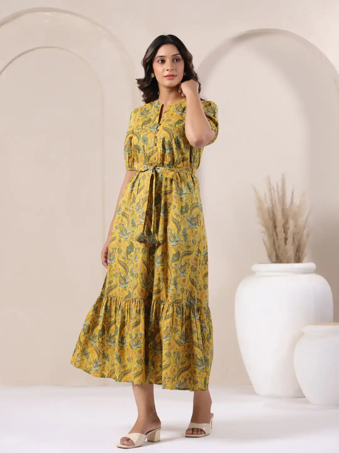 Yellow floral print cotton kurta dress with tiered skirt and puff sleeves for women