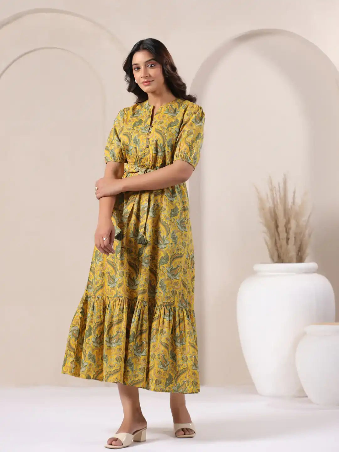 Yellow paisley print cotton kurta dress with tiered hem, perfect for daily wear or celebrations