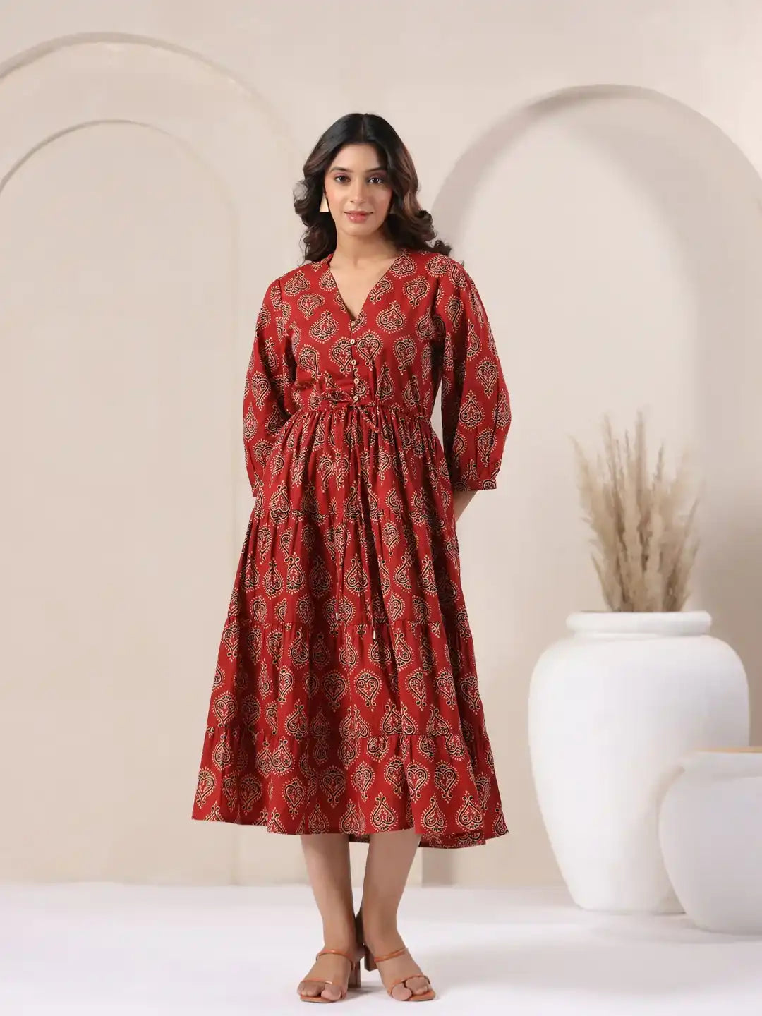 Red printed cotton kurta dress with tiered skirt, V-neck, and puff sleeves for women