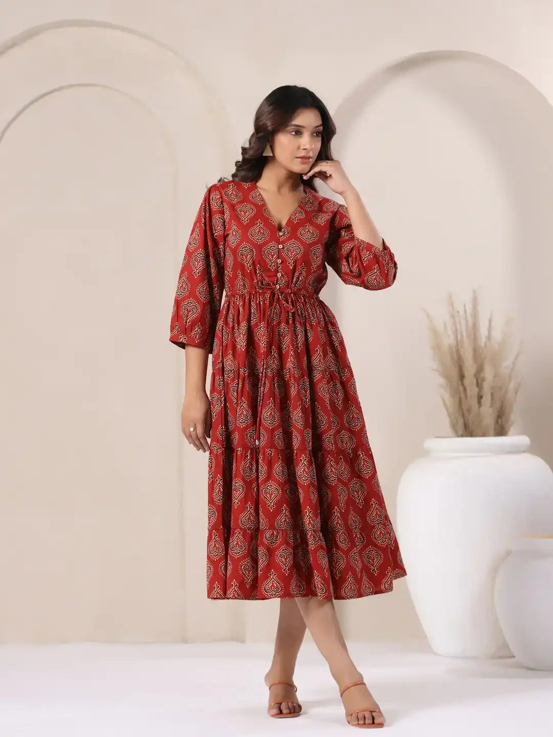 Red printed cotton kurta dress with V-neck and tiered skirt for women, elegant daily wear
