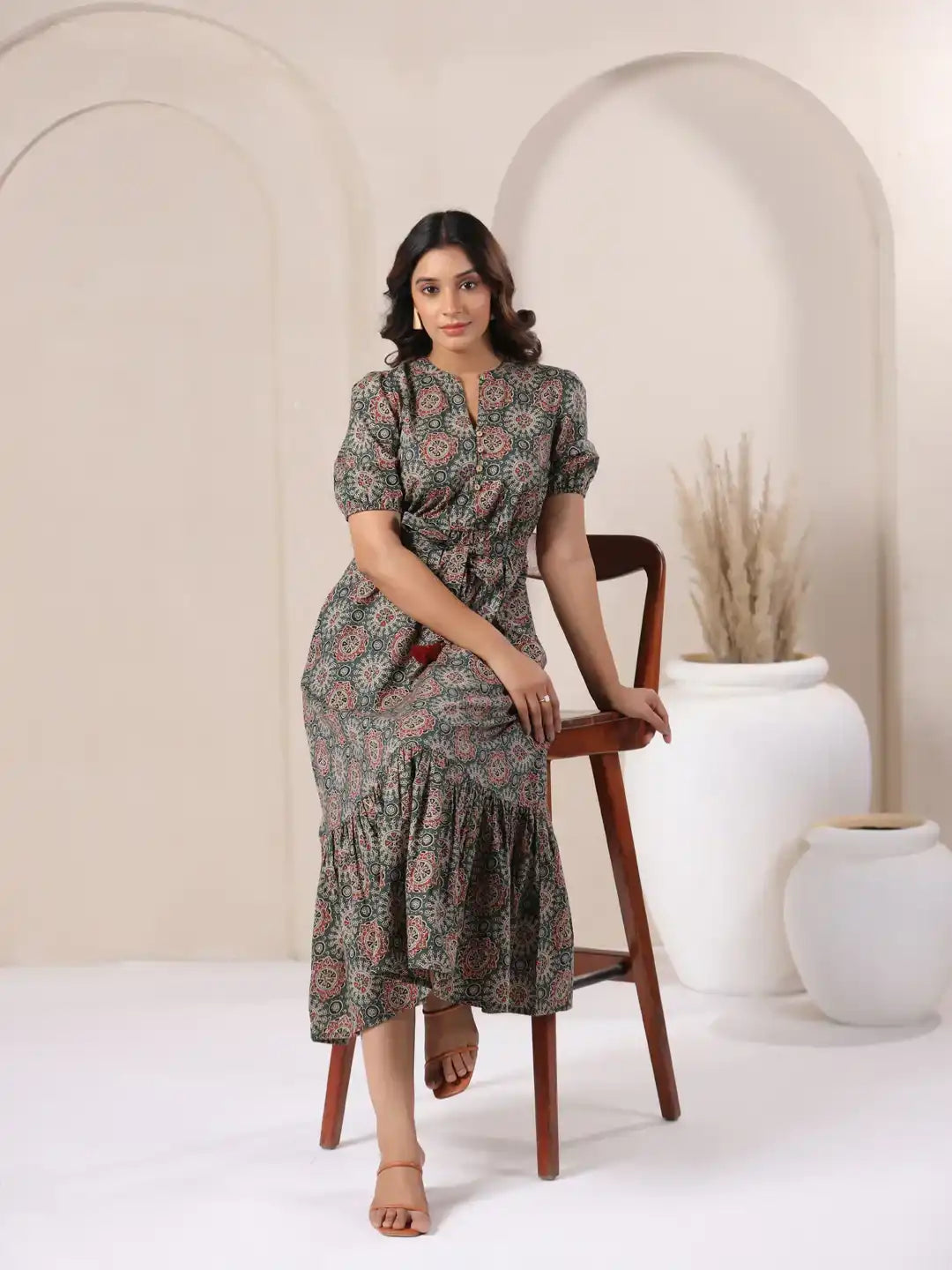 Woman in elegant printed cotton kurta dress with puff sleeves, perfect for daily wear or office