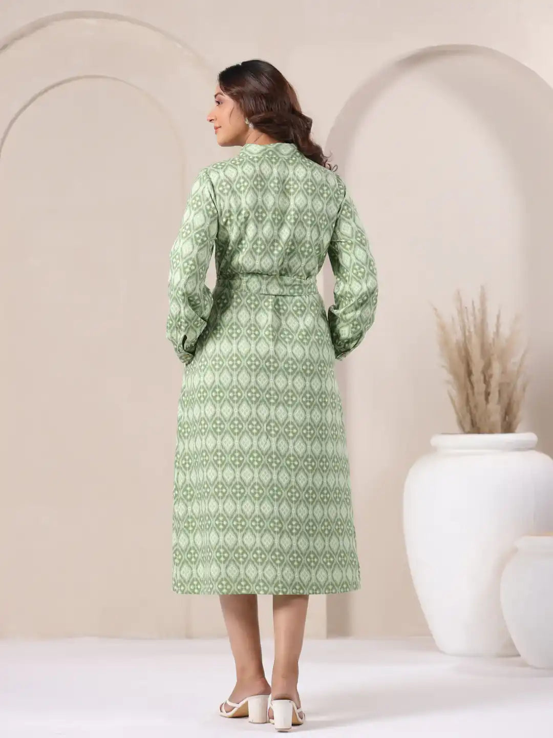 Green patterned cotton kurta with long sleeves and waist tie, ideal for daily wear or office