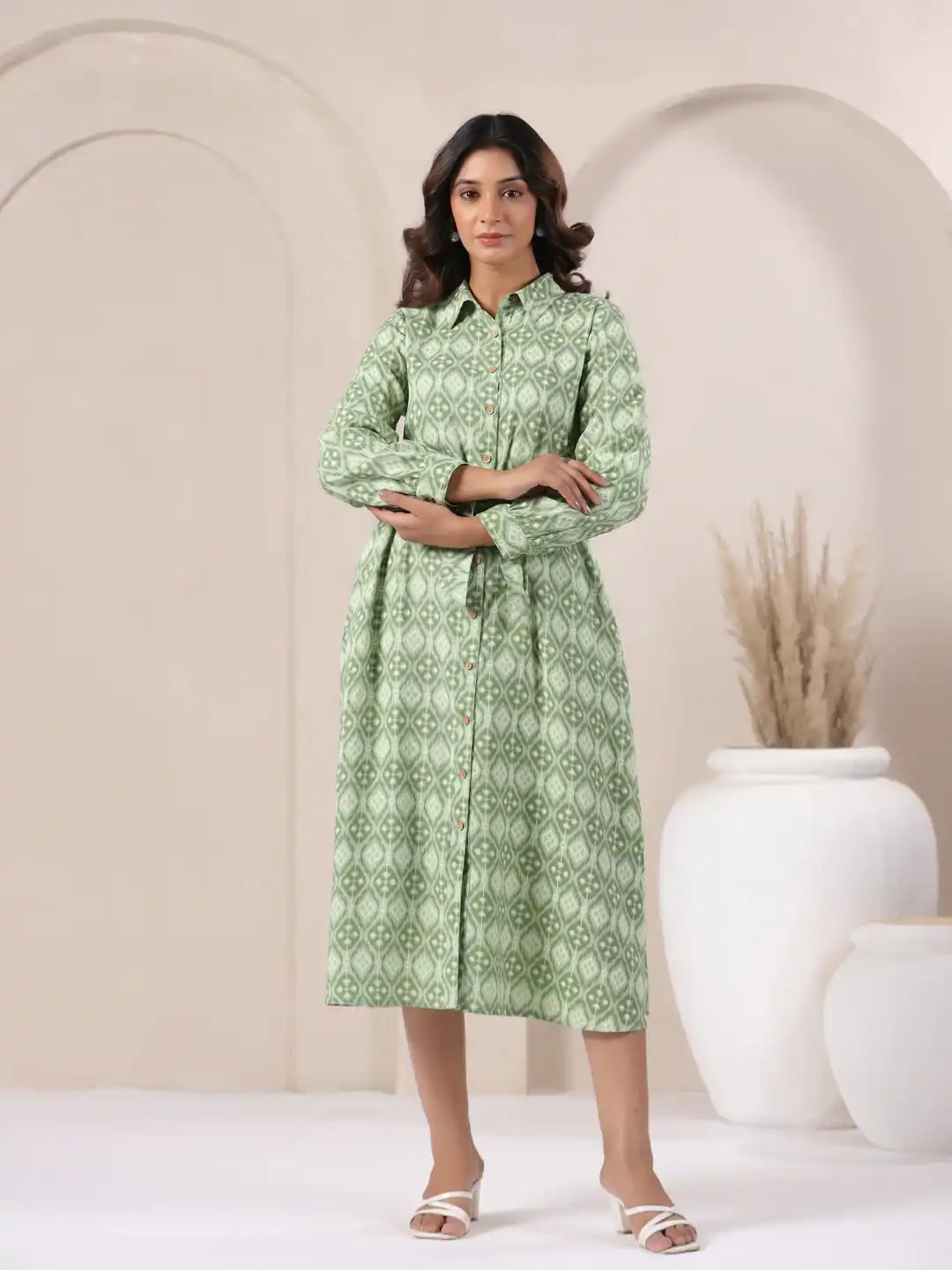 Green printed cotton kurta dress for women, elegant daily wear with geometric pattern and button front
