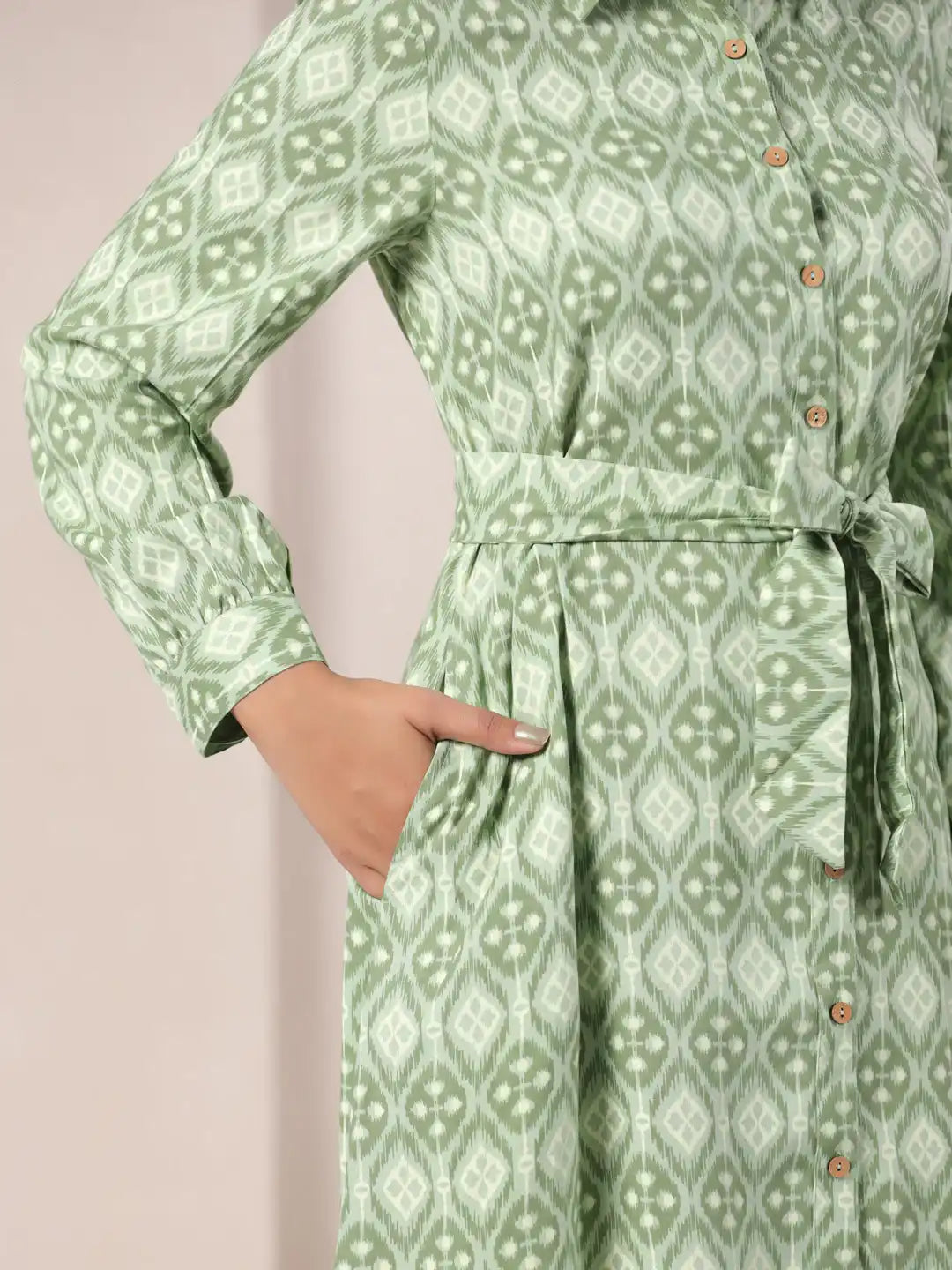 Green ikat print cotton kurta with tie waist and button front, perfect for daily wear or office