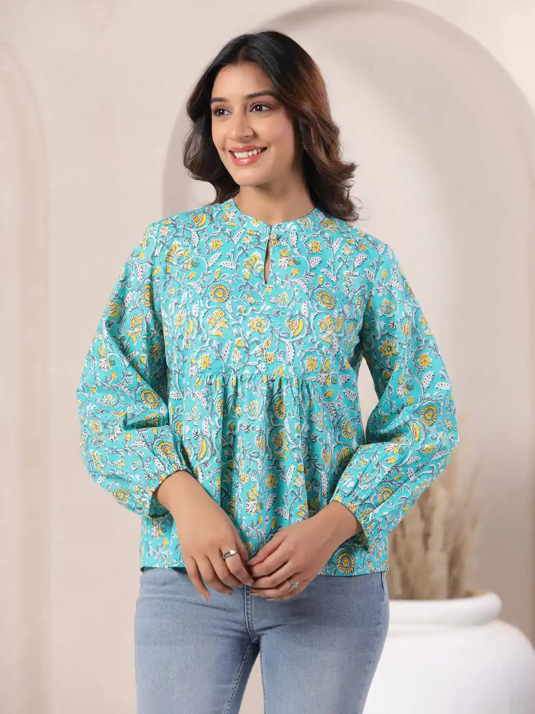 Turquoise floral print cotton kurta with puff sleeves, perfect for daily wear or office