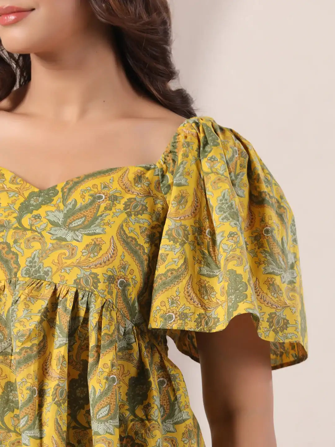 Yellow paisley print cotton kurta with puff sleeves for women