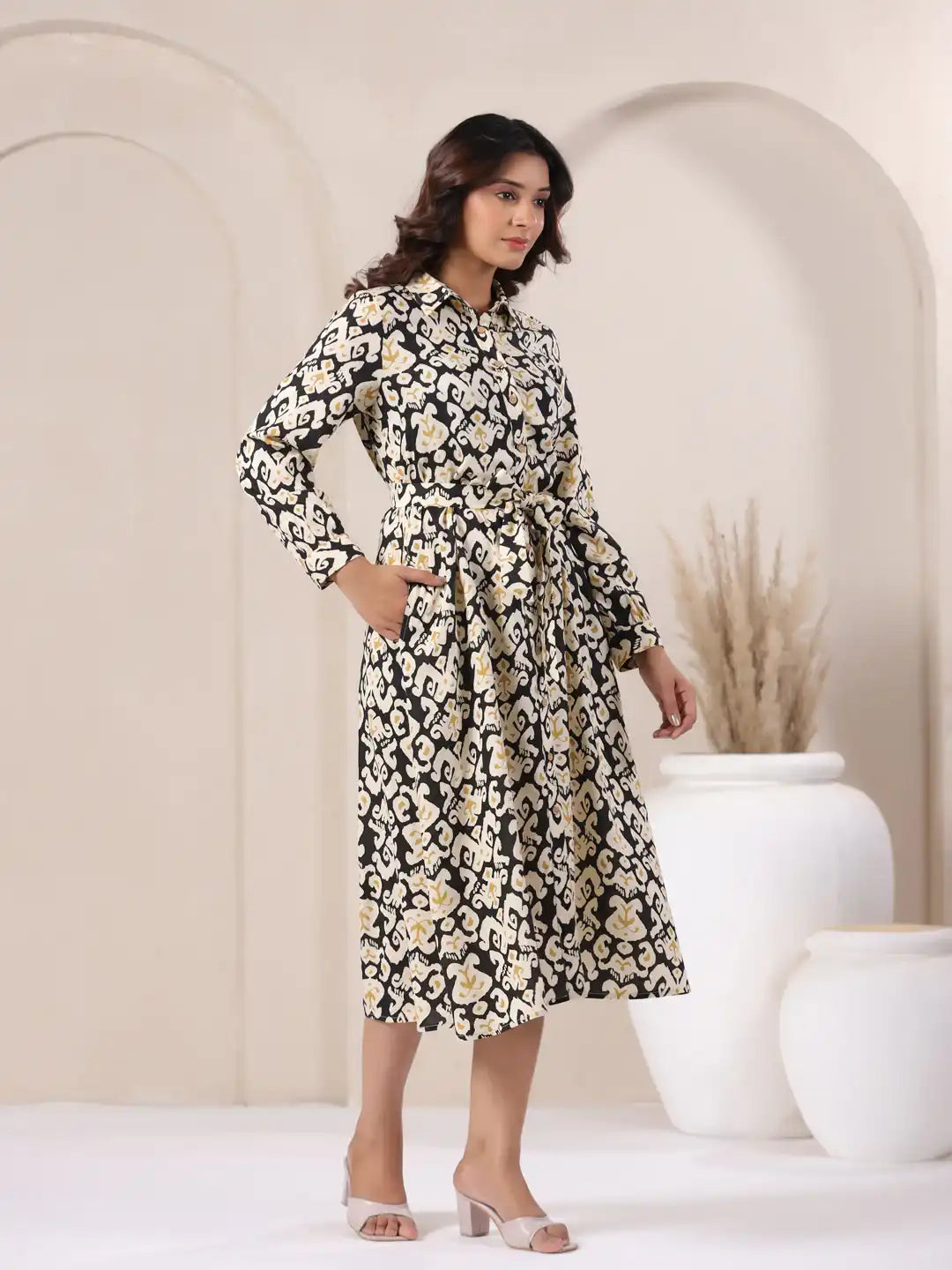 Elegant black and white floral print cotton kurta dress for women, perfect for daily wear or celebrations.