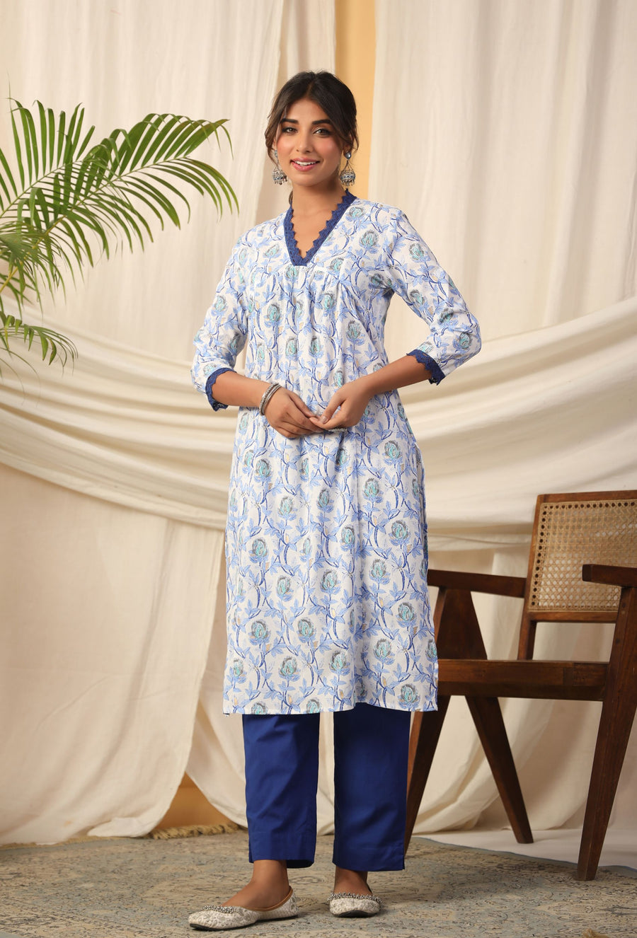 Blue floral print cotton kurta with solid blue pants, elegant women's ethnic wear for daily or office use