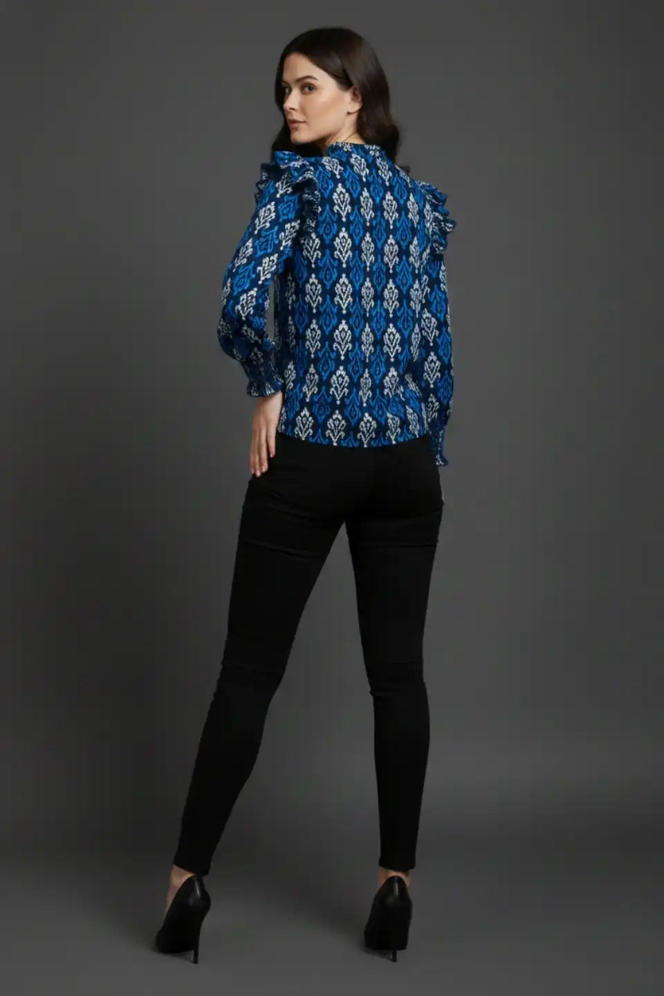Blue patterned cotton kurta with ruffled sleeves paired with black pants