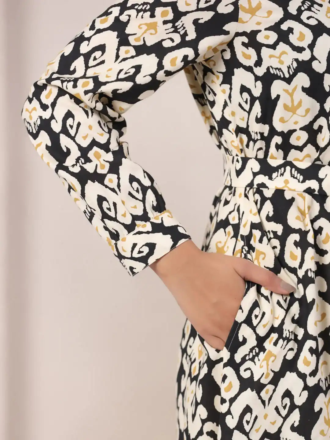 Black and white ikat print cotton kurta with gold accents, elegant for daily wear or celebrations
