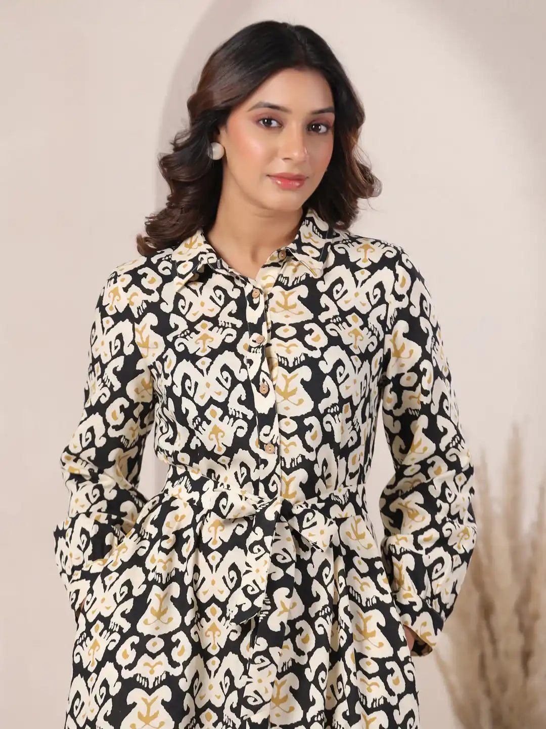 Elegant black and white printed cotton kurta with gold accents, perfect for daily wear or celebrations.