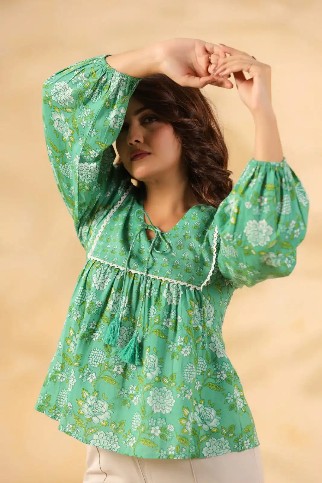 Green floral print cotton kurta with puff sleeves and tassel tie for women