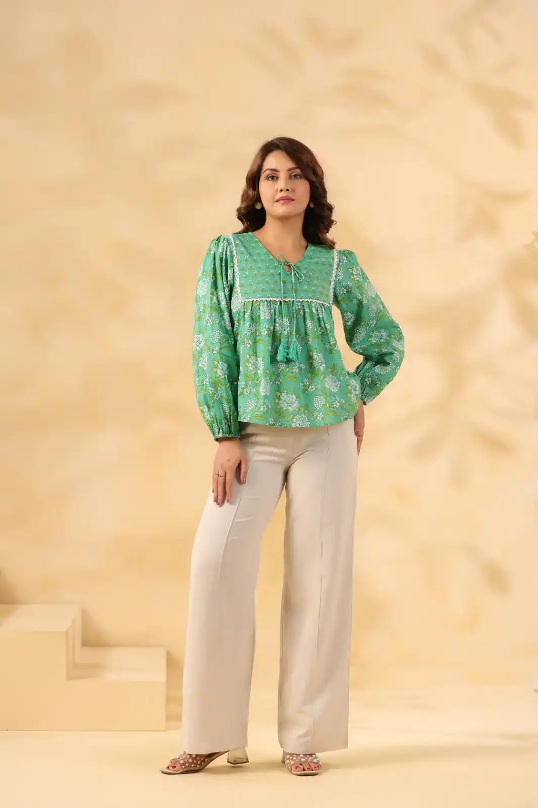 Green floral print cotton kurta with puff sleeves and cream palazzo pants for women