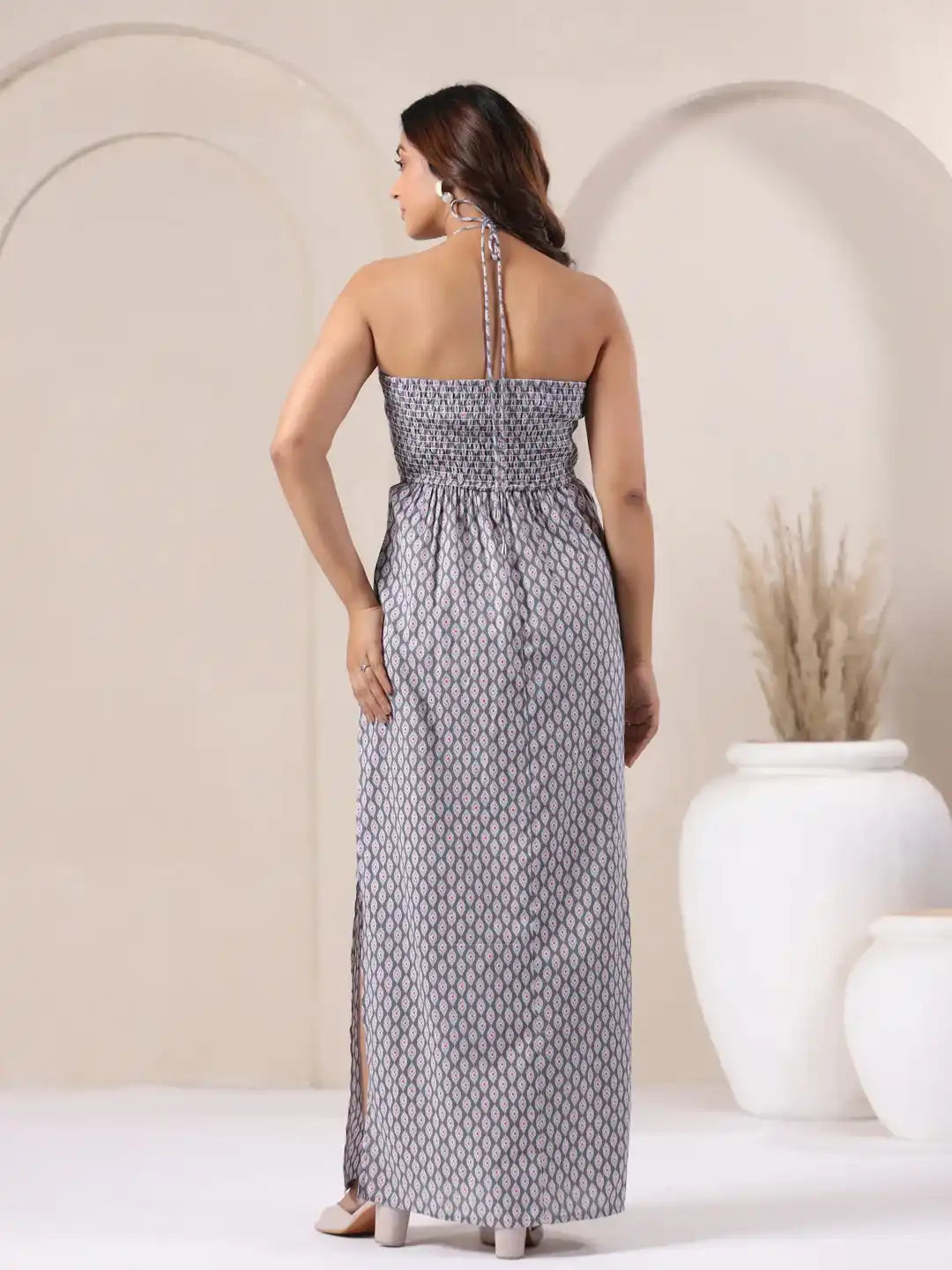 Women's gray patterned strapless maxi dress with back tie, side slit, and smocked waist for elegant daily wear