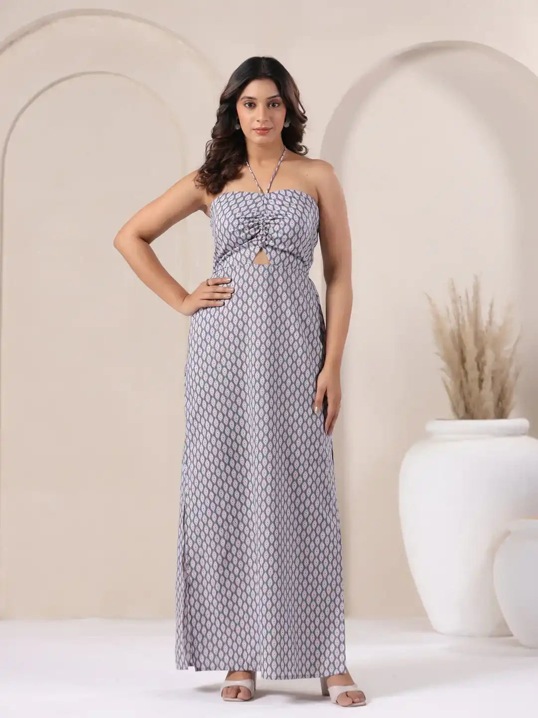 Grey patterned strapless maxi dress with front cutout, elegant for daily or festive wear