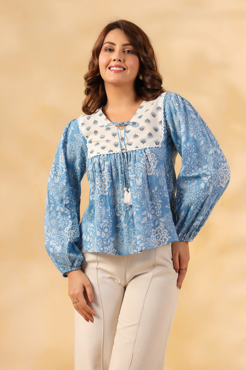 Blue floral print cotton kurta with white lace collar and puff sleeves for women