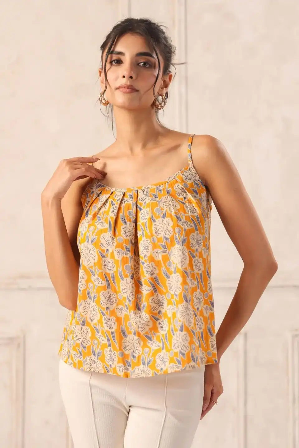 Womanwearingyellowfloralstrappytopcasualsummeroutfit - VyomTara