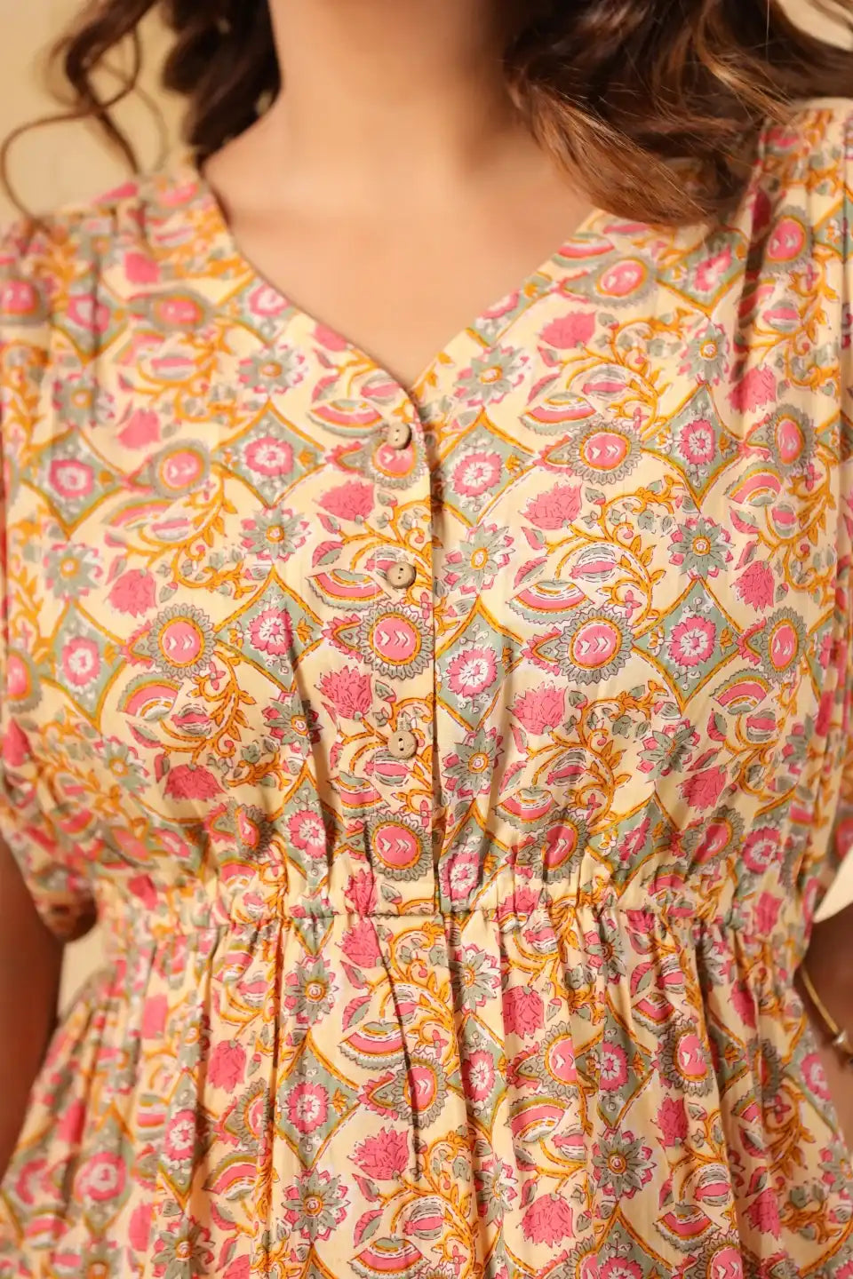 Floral print cotton kurta with V-neck and button front, perfect for daily wear or celebrations