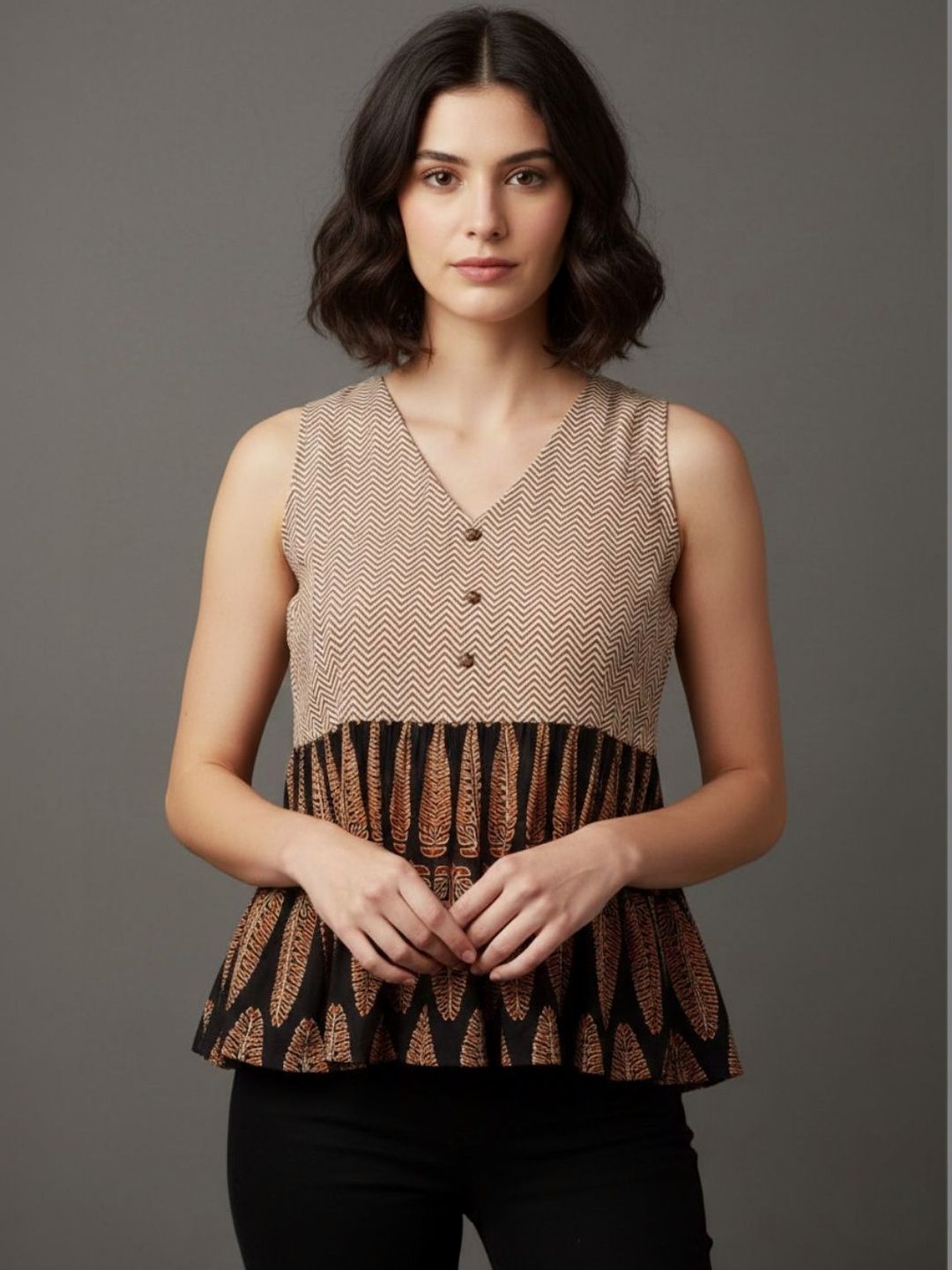 Beige & Black Dual Print Sleeveless Peplum Top