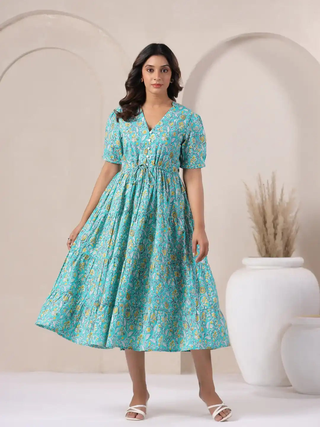 Turquoise floral print cotton kurta dress with puff sleeves, ideal for daily wear or celebrations