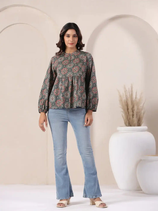Floral printed cotton kurta with bell sleeves paired with flared jeans for women