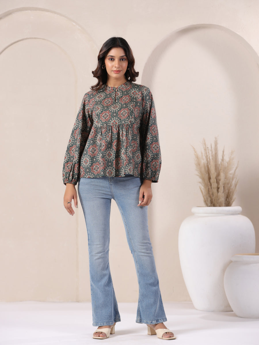 Floral printed cotton kurta with bell sleeves paired with flared jeans for women