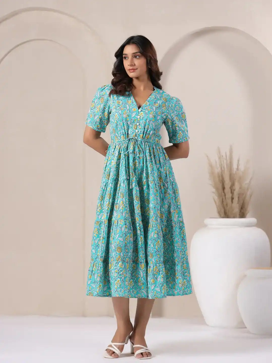 Turquoise floral print cotton dress with V-neck and drawstring waist, perfect for daily wear or celebrations